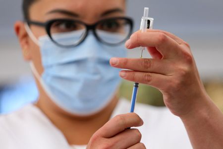 Pfizer COVID vaccine price hike to boost revenue for years, rivals may follow