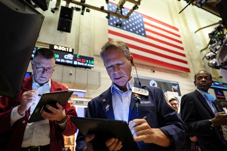 Wall Street mixed, European shares end nearly flat; sterling, euro fall