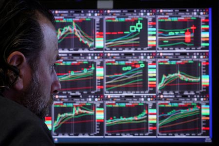 Global stocks to grind higher, lacklustre year ahead: Reuters poll