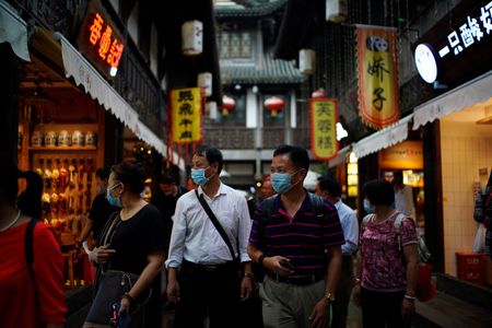 Analysis-China’s services sector eyes recovery after reopening, but challenges loom