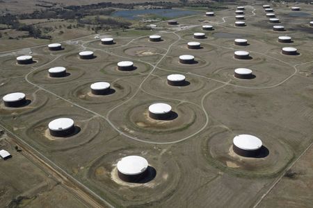 Oil falls $2/barrel on economic jitters, U.S. crude stock build