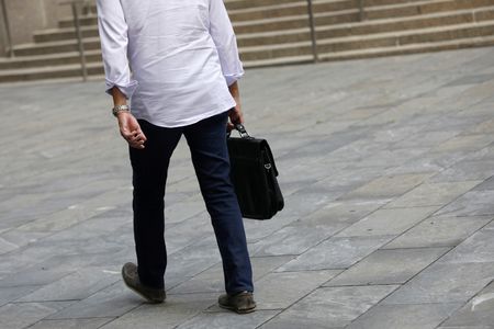 New York law firm Shearman & Sterling lays off lawyers and staff