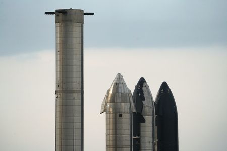 SpaceX test-fires Starship booster in milestone for debut orbital launch