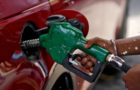 Oil settles down 1%, then drops more on hint of big U.S. crude build