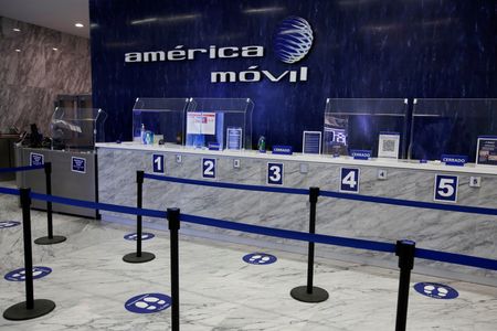 Mexico’s America Movil Q4 net profit tumbles, hit by Chile unit deconsolidation