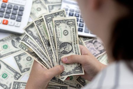 Dollar rises to six-week peak as strong U.S. retail sales bolster higher-rates scenario