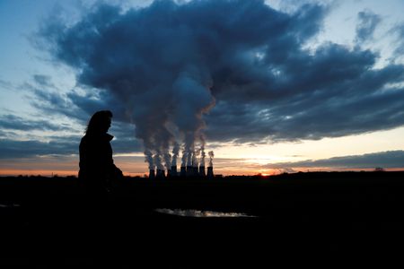 Analysis-Pain and gain for industry as EU carbon hits 100 euros