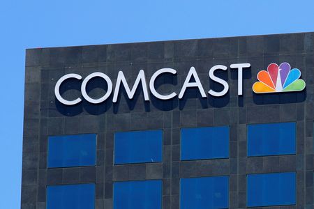 Comcast takes advantage of AI rally to sell more BuzzFeed shares