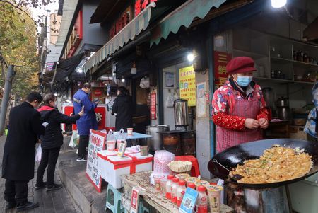 Businesses in China’s Wuhan face fresh worries after COVID easing